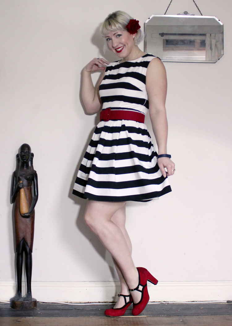 black and white dress with red shoes