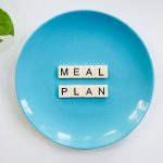 blue ceramic plate with meal plan blocks